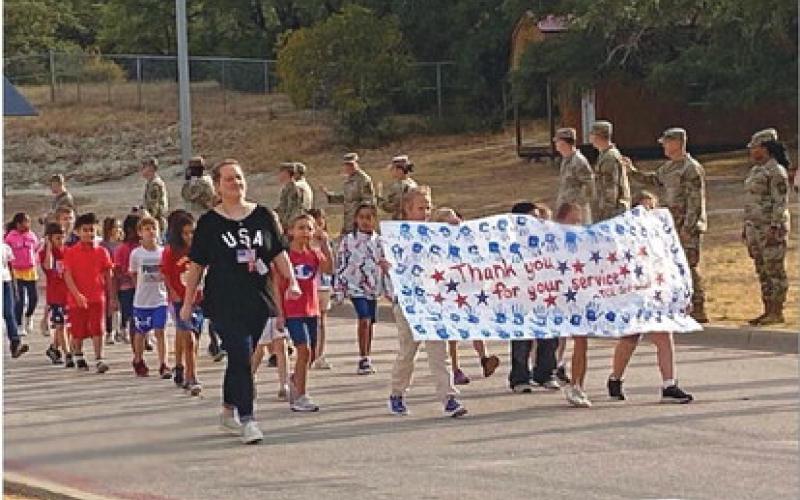 Taylor Creek Elementary students walk around campus during Monday’s parade to honor 9/11 heroes. courtesy photo