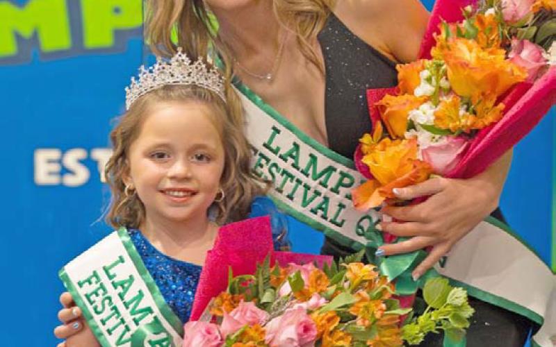 Sagen Plouff, right, stands with Little Miss Spring Ho Berkley Ann Shuffler after the two were crowned at last year’s festival. ADAM BARRIOS | DISPATCH RECORD