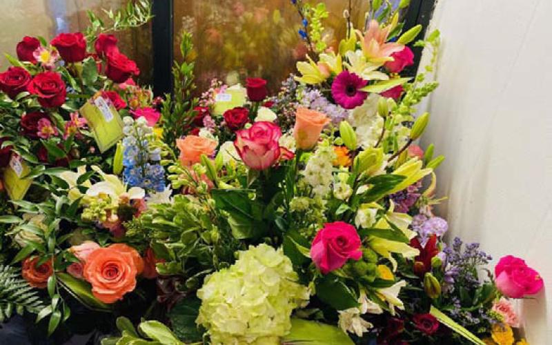 Florists at Petal Peddler Gifts &amp;amp; Floral Design arranged this colorful display. COURTESY PHOTO | PETAL PEDDLER GIFTS &amp;amp; FLORAL DESIGN