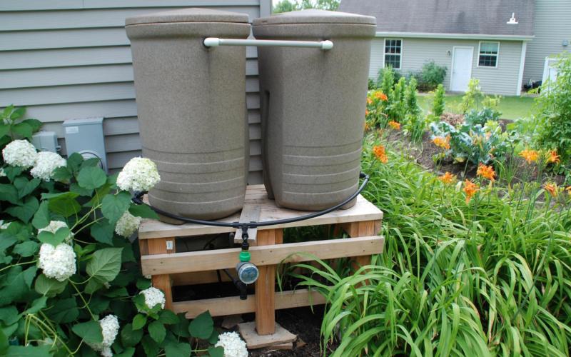 Elevate your rain barrel for easier access to the spigot for filling containers and to speed water flow with the help of gravity. COURTESY PHOTO | MELINDAMYERS.COM