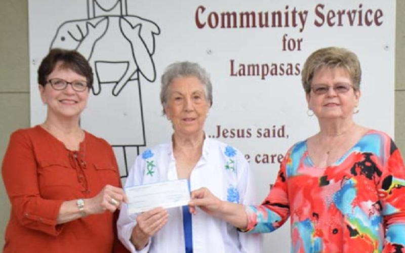 Lampasas County Farm Bureau directors Patsy Stoneham, left, and Donnis Self, right, present a donation to Lampasas Mission -- represented by Jan Herron, board secretary/treasurer. DAVID LOWE | DISPATCH RECORD
