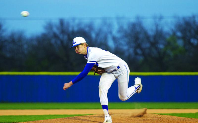 HUNTER KING | DISPATCH RECORD Jonas Andersen releases a pitch during his start in the second district game of the season.