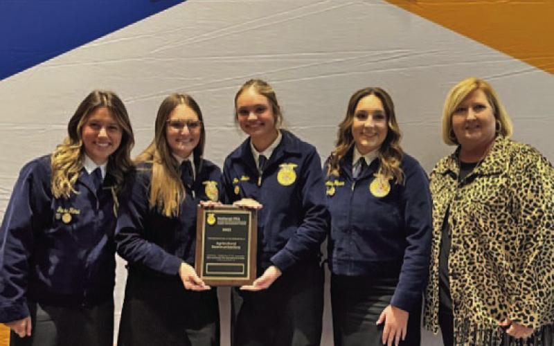 Congratulations are extended to the Lampasas FFA Agricultural Communications team that placed seventh in the national contest and ranked as a “gold team.” The award was presented last week at the National FFA Convention in Indianapolis. Team members are, from left, Jacie Resa, Paige Rutland, Morgan Littlefield Bobo and Avery Hopson, joined by FFA adviser and team coach, Judy Hail. COURTESY PHOTO