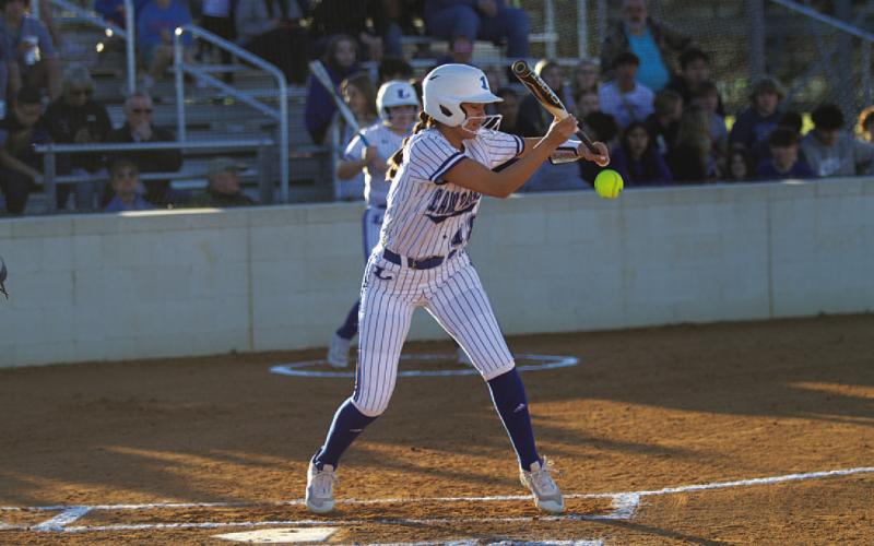 Madison Magilke lays down a bunt during an early-season game against Killeen Ellison. HUNTER KING | DISPATCH RECORD