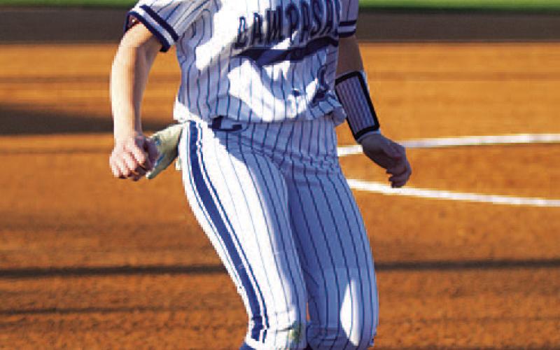 Jenni Posten trots home to score a run. HUNTER KING | DISPATCH RECORD