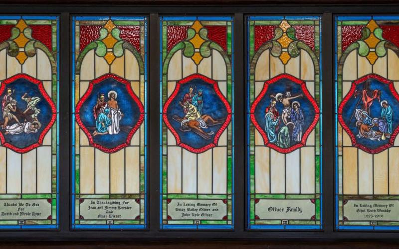 These recently restored stained-glass windows at St. Mary’s Episcopal Church portray the events of Christ’s crucifixion, all the way from His walk with the cross to when He was buried. COURTESY PHOTO