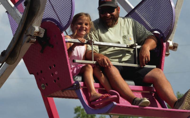 Rides like the ferris wheel bring a bit of nostalgia to the Spring Ho Festival. FILE PHOTO