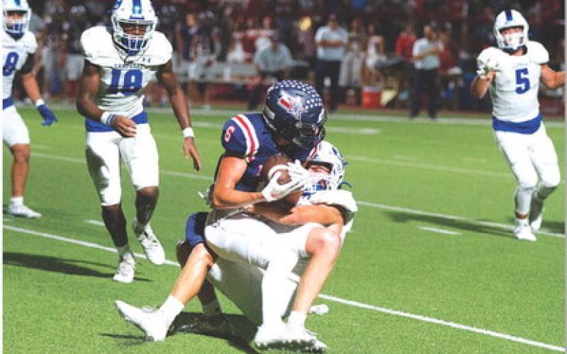 Parker Weinheimer makes the tackle on a tough fourth-down stop. HUNTER KING | DISPATCH RECORD