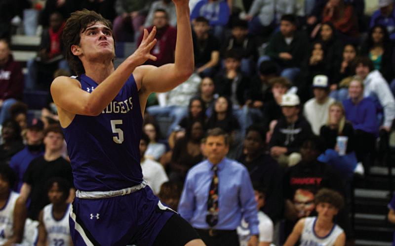 Trent Seneca rises toward the basket for a layup. HUNTER KING | DISPATCH RECORD