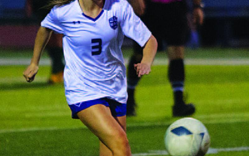Aubrey Stubbs saw action in the midfield in last Friday’s match against Academy. HUNTER KING | DISPATCH RECORD