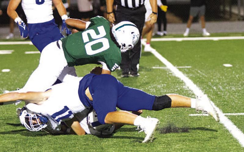 Landon Richardson takes down a Taylor receiver. HUNTER KING | DISPATCH RECORD