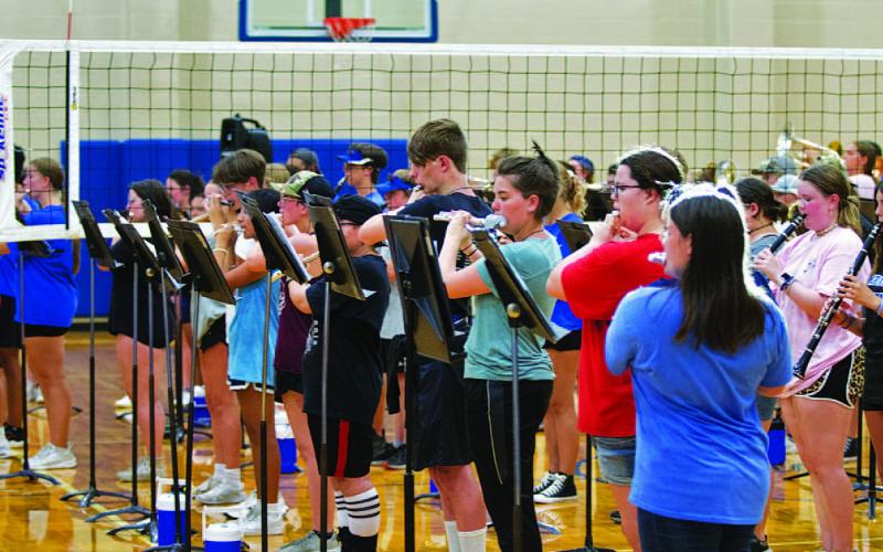 HUNTER KING | DISPATCH RECORD The woodwind section performs their part during rehearsal on Monday evening. The Lampasas High School Badger Band performed for an informal crowd in the school gymnasium.