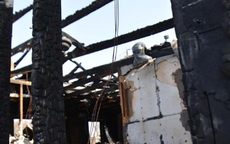 A fire Monday morning destroyed the Fields family’s house on Snell Drive, but Tara Fields said her family is thankful for the help it has received from community members. MONIQUE BRAND | DISPATCH RECORD