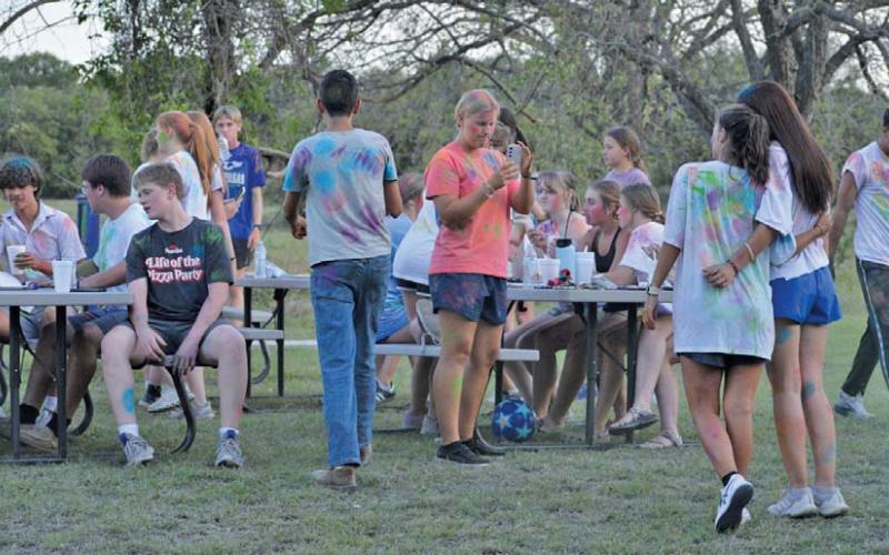 Lampasas Young Life members enjoyed fellowship time after Monday’s paint wars activity. erick mitchell | dispatch Record
