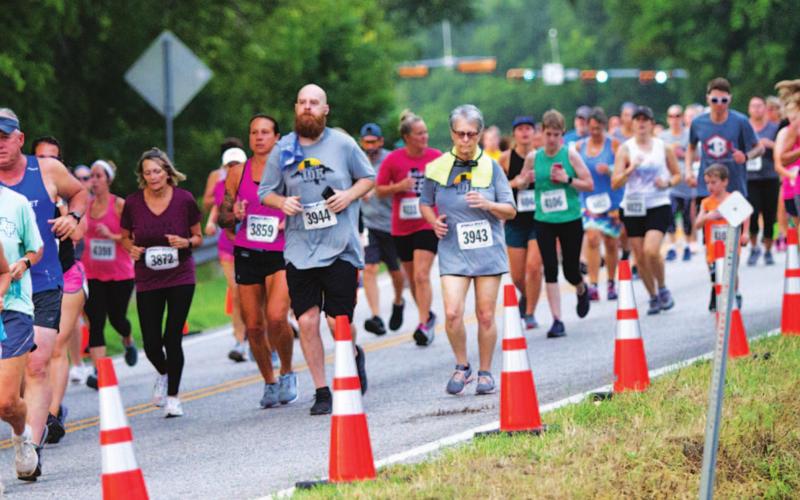 Runners take off from last year’s Toughest 10K in Lampasas. FILE PHOTO