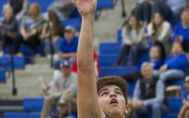 Basketball teams pick up pre-Thanksgiving wins