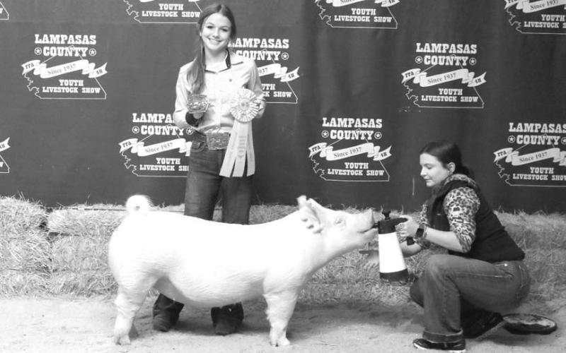 MASON HINES | DISPATCH RECORD Ella Montgomery took home the honors for reserve champion breeding gilt as well as the intermediate showmanship award for swine.