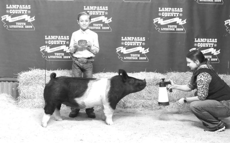 MASON HINES | DISPATCH RECORD Bryant Lucky Bumpas was awarded the junior showmanship award for swine.