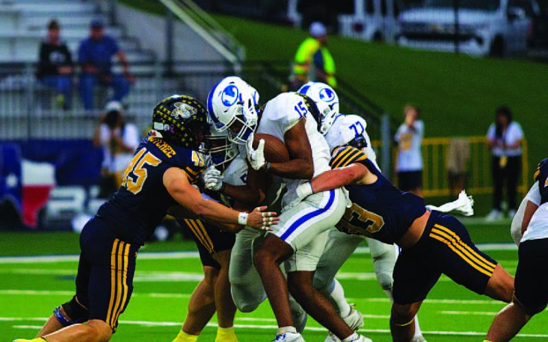 HUNTER KING | DISPATCH RECORD Wesley Stephens and his running back partner KJ Reed will be important tonight.