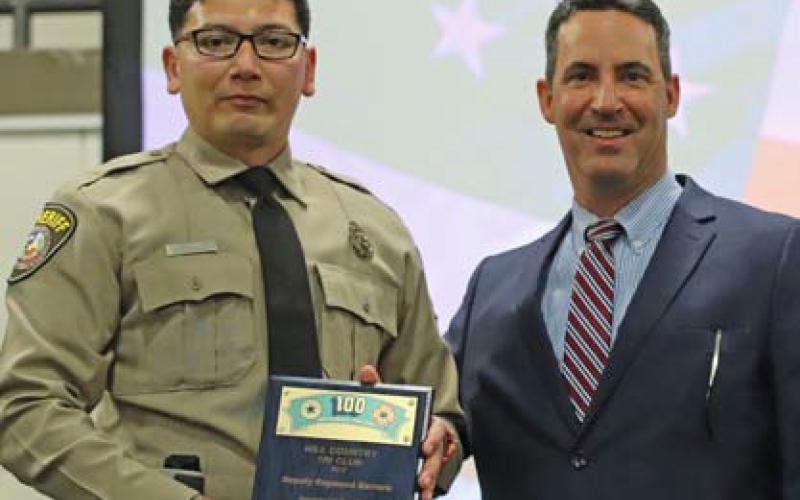 Raymond Barrera, left, is awarded Deputy of the Year for Lampasas County Sheriff’s Office. COURTESY PHOTO | HILL COUNTRY 100 CLUB