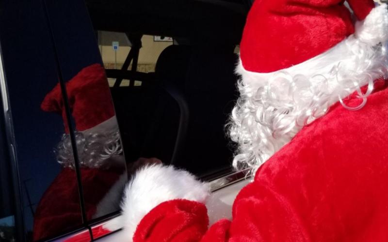 Santa and his helpers to drive through town