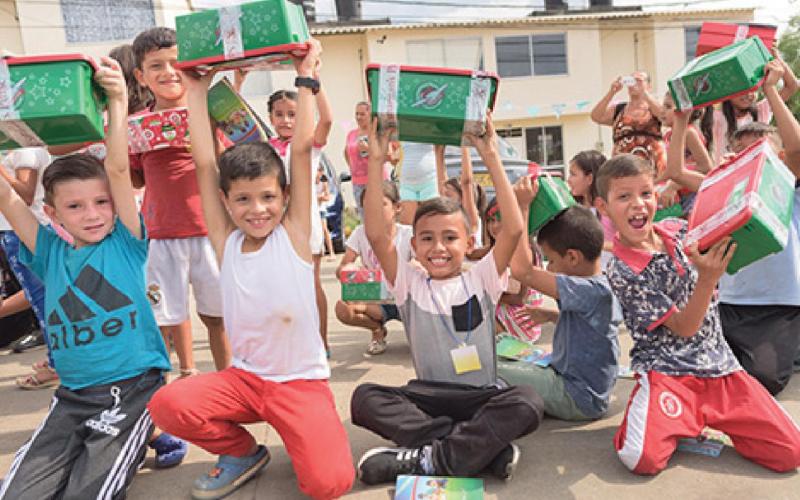 Operation Christmas Child prepares shoebox gifts for children such as these in countries around the world. COURTESY PHOTO | SAMARITAN’S PURSE