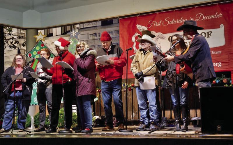 Members of the Lampasas Methodist Church braved the damp cold to bring warmth through music to the weekend festivities. JOYCESARAH MCCABE | DISPATCH RECORD