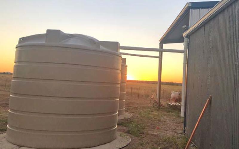 Gernentz utilizes a water catchment system and water storage collection tanks to pipe water to cattle. courtesy photo