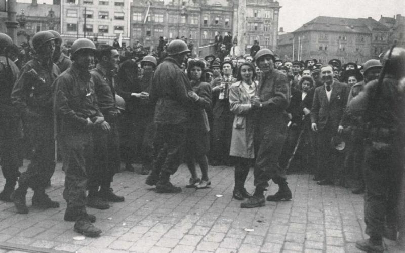 PHOTO FROM COMBAT HISTORY OF THE SECOND INFANTRY DIVISION IN WORLD WAR II May 8 marked the 80th anniversary of Victory in Europe Day. This photo shows a celebration in Pilsen, Czechoslovakia, where U.S. troops were greeted by cheering throngs of local residents after Nazi Germany’s surrender in 1945.