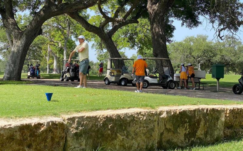 Golfers wait to tee off during last weekend’s Britches and Bows tournament at Hancock Park Golf Course. COURTESY PHOTO