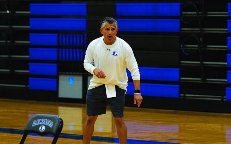 HUNTER KING | DISPATCH RECORD Marcus Chapa coaches his team at practice early in the 2024-2025 season.