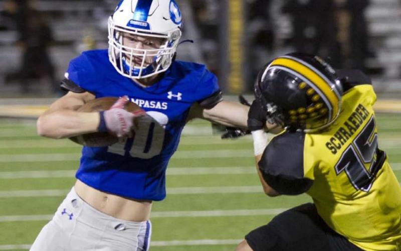Carson Bekker stiff-arms a Gatesville defender during his first game of the season coming off surgery from the spring. HUNTER KING | DISPATCH RECORD