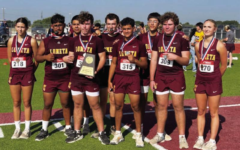 The Lometa cross country team poses with all their hardware from the district meet. They will compete at the regional race on Oct. 21. COURTESY PHOTO | AUSTIN MARTIN