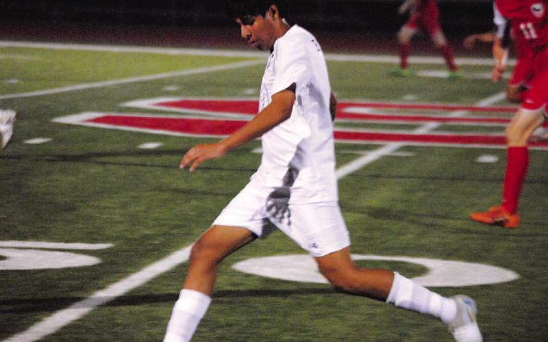 Jose Gomez prepares to play