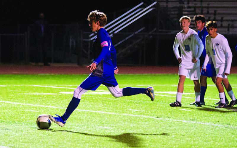 Parker Boykin scored this penalty kick for the Badgers. HUNTER KING | DISPATCH RECORD