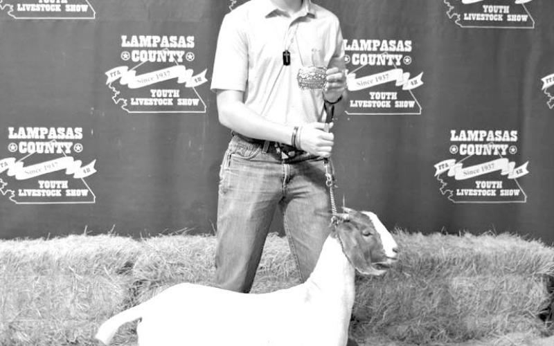 Jonathan Harris garnered the Buddy Perry Award this year. He is pictured with his breeding goat entry. ERICK MITCHELL | DISPATCH RECORD