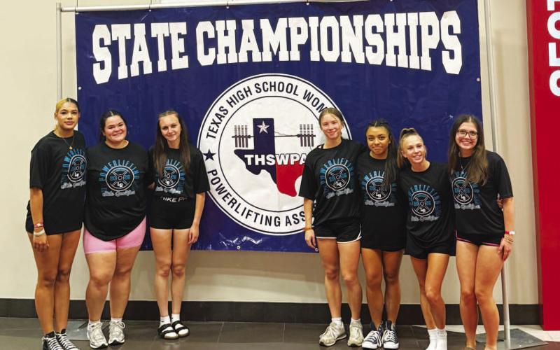 Lady Badger lifters pose for a photo at the state powerlifting meet last weekend. COURTESY PHOTO