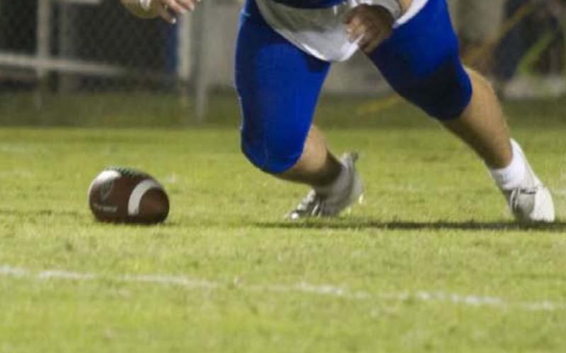 Conner Keele falls on a fumble, one of the five takeaways the Badgers came away with Friday night. HUNTER KING | DISPATCH RECORD