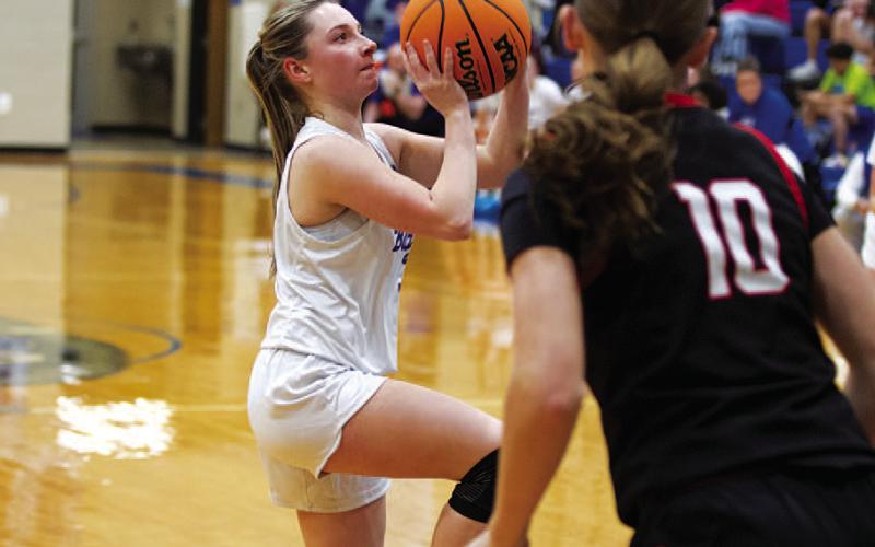 HUNTER KING | DISPATCH RECORD Abra White attempts a floater in the paint againt the Lady Eagles on Tuesday.