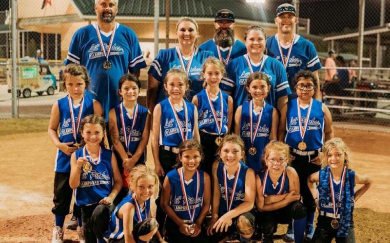 The 8U coach pitch team Lil’ Pitches placed third and went 3-2 in a district tournament in Temple. Pictured are, bottom row left to right, Jordi Andrews, Aaryn Friedlander, Sadie Walker, Holley Ann Wakeman, Brooklyn Brewer and Cora Eckermann; middle row, Kadi-Ann Harris, Evalynn Seward, Blake Andrews, Brynn Crawford, Riley Banks and Amsi Suarez; back row, coaches Derrek Eckermann, Misty Wakeman (head coach), Jeff Crawford, Jennifer Harris and Justin Andrews. COURTESY PHOTO