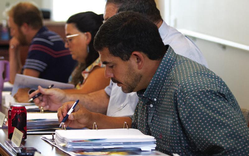 Council members, from left, Edward Gold, Cathy Kuehne, Mayor Herb Pearce and Eric Hernandez pour over budget materials that outline expenditure requests from various city departments. Another budget workshop is planned for Monday at 3 p.m., when revenue figures are expected to be presented. COURTESY PHOTO