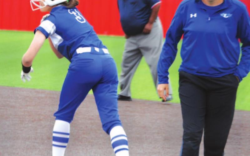 Hannah Perry stands on first after a single in the Lady Badgers’ contest in Salado last week. HUNTER KING | DISPATCH RECORD