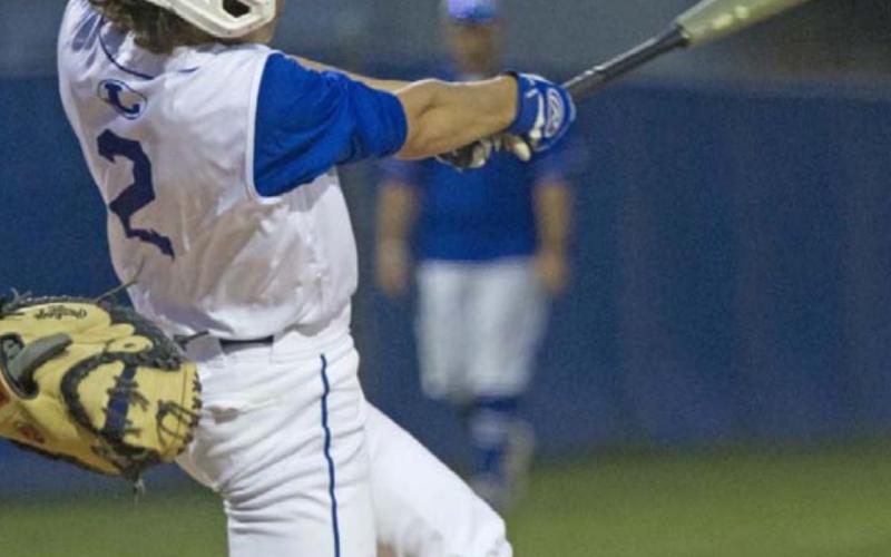 Elijah Stanley hits a double in the bottom of the fourth against Brownwood. JEFF LOWE | DISPATCH RECORD