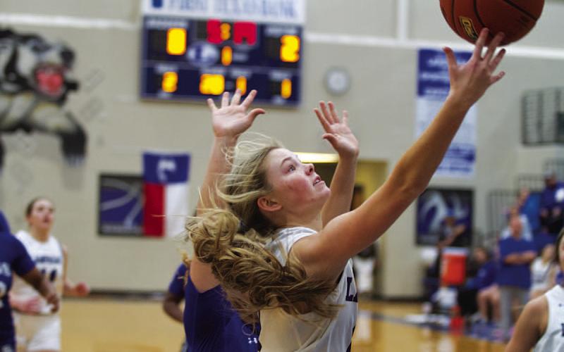 HUNTER KING | DISPATCH RECORD Addison Borchardt makes a right-handed layup during the first half of the Lady Badgers’ game against Copperas Cove on Tuesday.