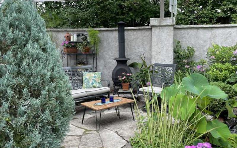This patio is transformed into an outdoor oasis and entertainment area. COURTESY PHOTO | MELINDAMYERS.COM