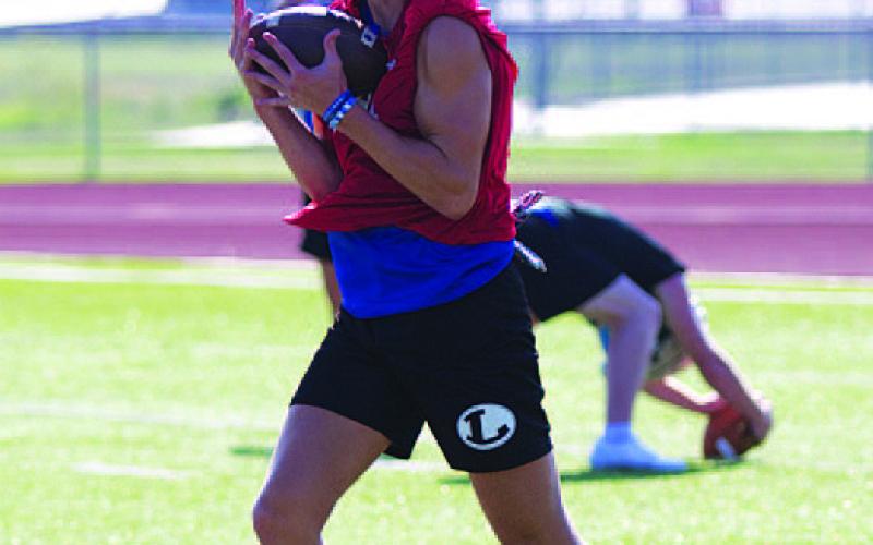Bryson Roberts works on kick returns as the Badgers are back for the fall. The first practice was Monday, and they will have practice today and Wednesday before school resumes Thursday. HUNTER KING | DISPATCH RECORD