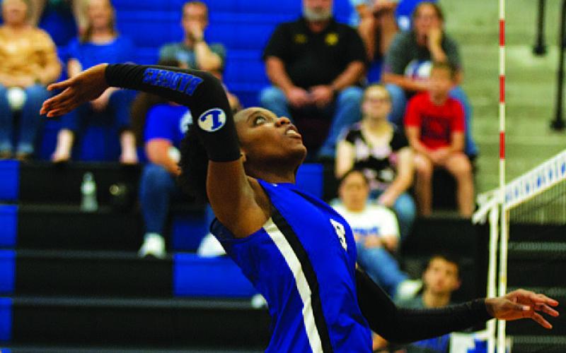 Angelina Davis swings out of the middle for the Lady Badgers. HUNTER KING | DISPATCH RECORD
