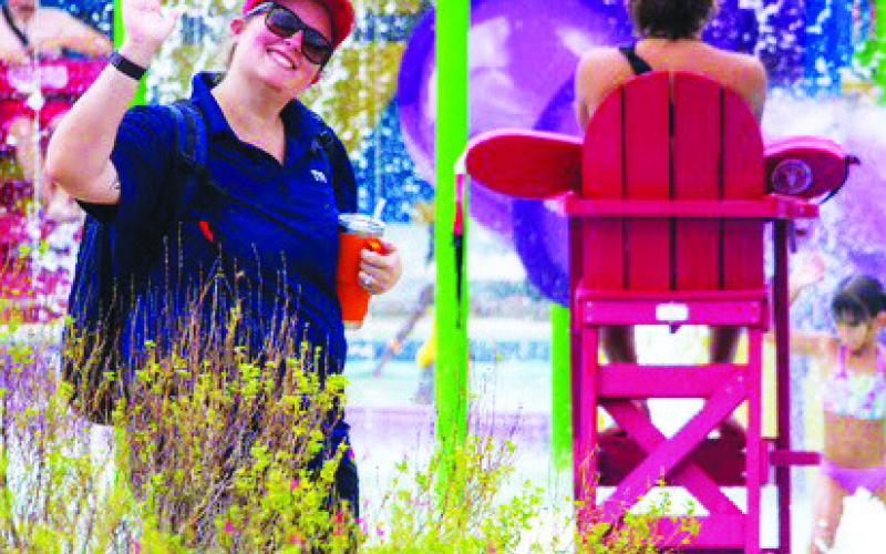 COURTESY PHOTO At left, Bailey Carter gives a wave to the camera during her time with Killeen’s Parks and Recreation Department. Now, Carter is looking to improve the Lampasas parks scene in her new role as recreation specialist for the city.