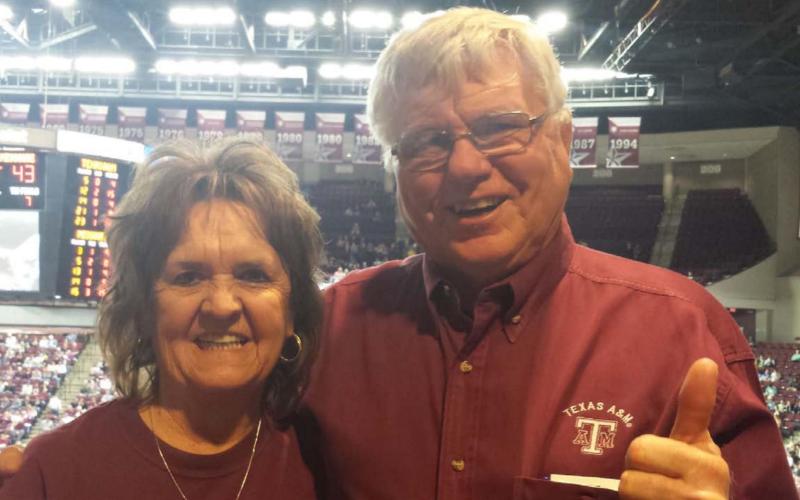 Dorothy and Jamie Briggs, shown at a Texas A&amp;amp;M basketball game, are longtime Aggie fans. COURTESY PHOTO