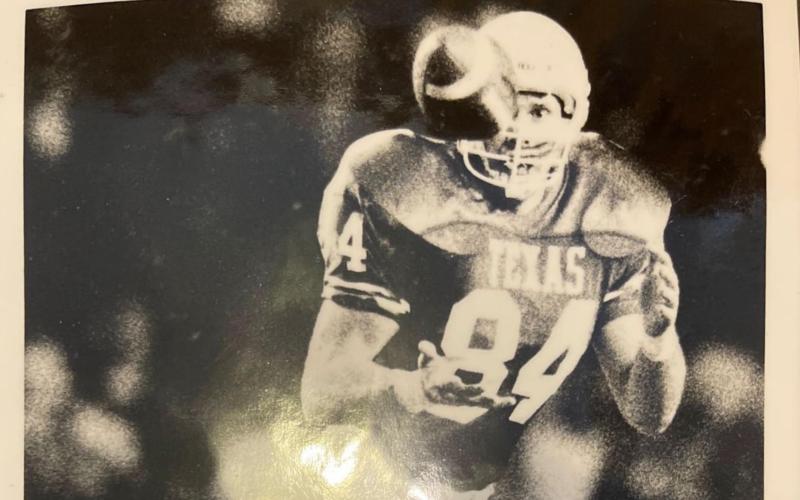 Curtis Thrift catches a pass during his time playing for the Texas Longhorns. Thrift played at UT in the late 1980s and early 1990s. COURTESY PHOTO